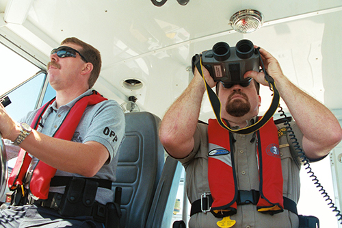 Law enforcement officers patrolling the Great Lakes